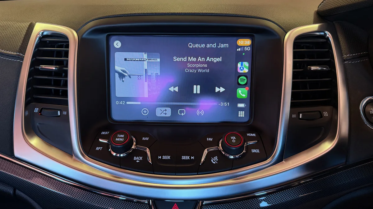 Wireless Apple CarPlay playing music on the factory MyLink screen of a Holden VF Commodore
